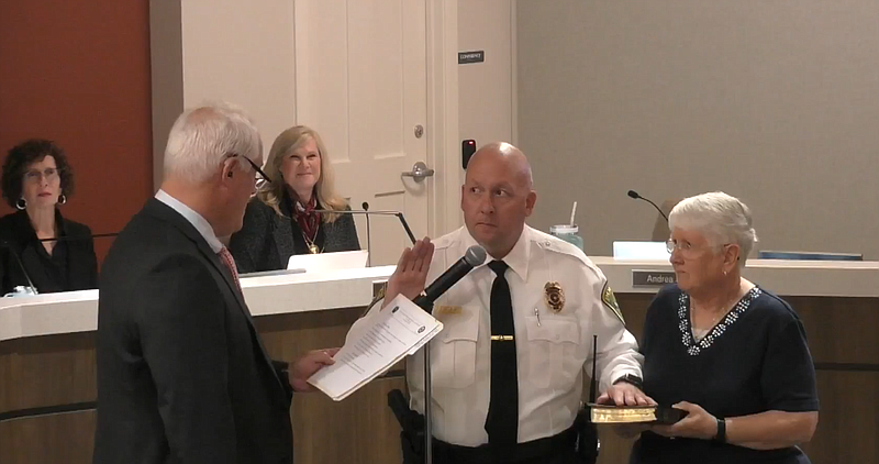 Bucks County Common Pleas Judge Matt Weintraub, left, swears in new Doylestown Township Police Chief Charles Zeigler. (Credit: YouTube)