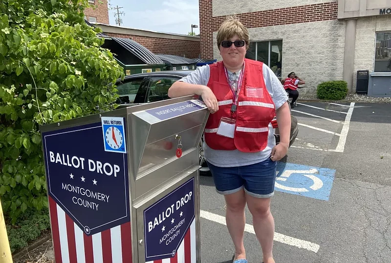 Nichole Holland was on hand to keep an eye on the ballot drop off box at the Montgomery County Health Department office on King Street in Pottstown in 2023. (Evan Brandt MediaNews Group file)