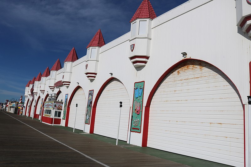 The gates are pulled down on Wonderland Pier's now-closed front entrance overlooking the Boardwalk.