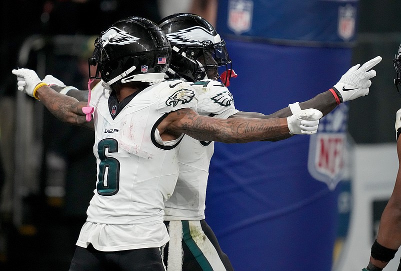 Sep 6, 2024; Sao Paulo, BRA; Philadelphia Eagles wide receiver A.J. Brown (11) celebrates after a touchdown with wide receiver DeVonta Smith (6) during the second half against the Green Bay Packers at Neo Quimica Arena. Mandatory Credit: Kirby Lee-Imagn Images