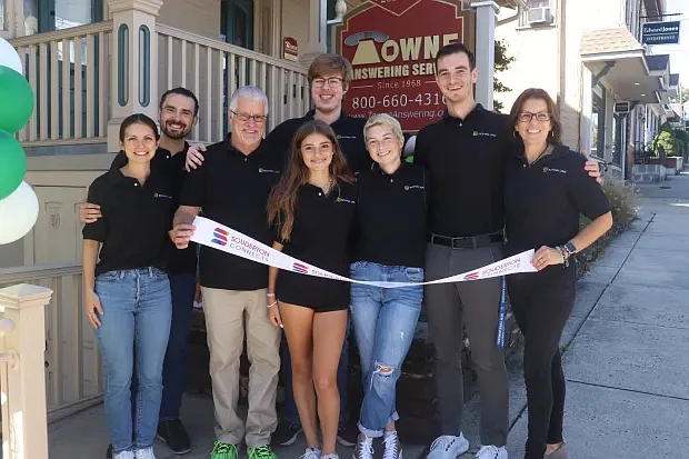 The Bigham family pose for a picture outside of the new Bigham Law office in Souderton.