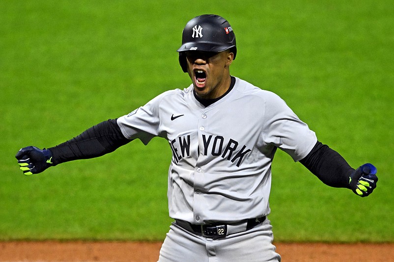 Oct 19, 2024; Cleveland, Ohio, USA; New York Yankees outfielder Juan Soto (22) celebrates after hitting three run home run during the tenth inning against the Cleveland Guardians during game five of the ALCS for the 2024 MLB playoffs at Progressive Field. Mandatory Credit: David Richard-Imagn Images