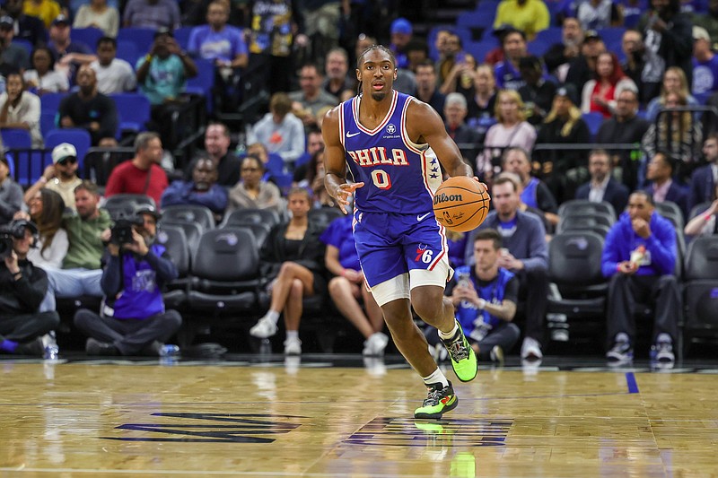 Oct 18, 2024; Orlando, Florida, USA; Philadelphia 76ers guard Tyrese Maxey (0) brings the ball up court during the first quarter against the Orlando Magic at Kia Center. Mandatory Credit: Mike Watters-Imagn Images