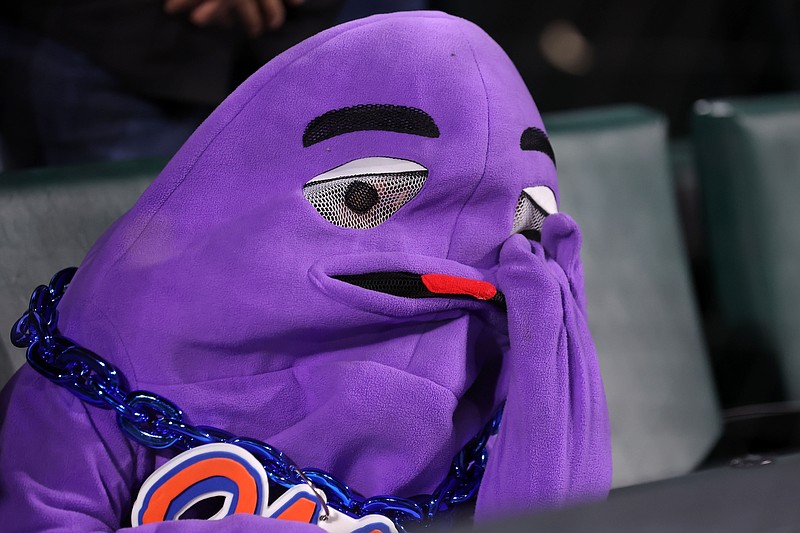 Oct 16, 2024; New York City, New York, USA; A New York Mets fan reacts in the ninth inning against the Los Angeles Dodgers during game three of the NLCS for the 2024 MLB playoffs at Citi Field. Mandatory Credit: Brad Penner-Imagn Images