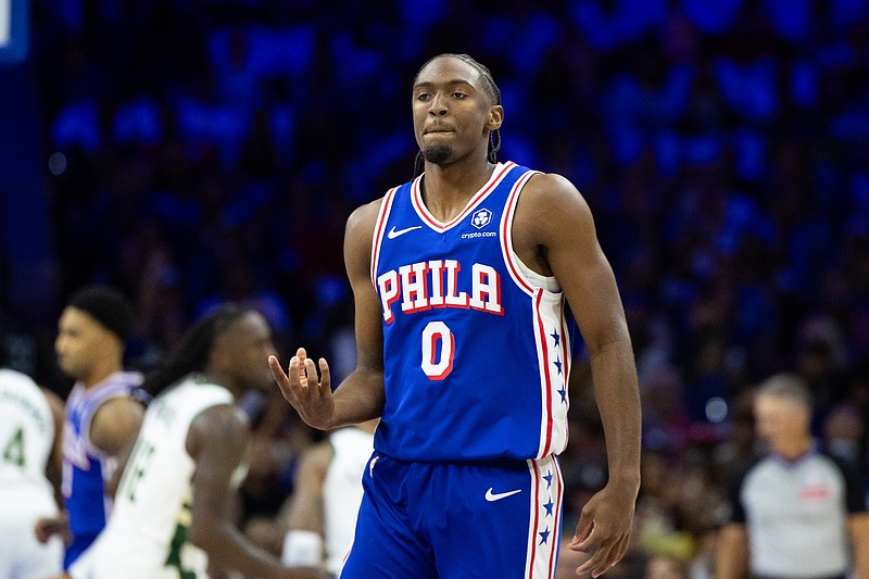 Oct 23, 2024; Philadelphia, Pennsylvania, USA; Philadelphia 76ers guard Tyrese Maxey (0) reacts to his three pointer against the Milwaukee Bucks during the first quarter at Wells Fargo Center. Mandatory Credit: Bill Streicher-Imagn Images