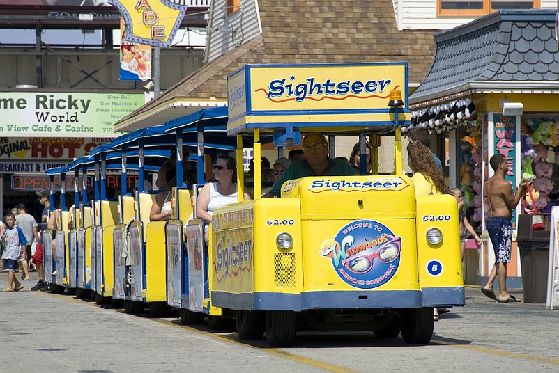 The tram car rolls down the Wildwood Boardwalk during a summer day. (Courtesy of the Wildwoods)