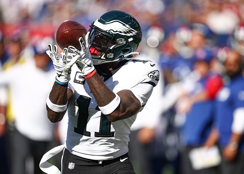 Oct 20, 2024; East Rutherford, New Jersey, USA; Philadelphia Eagles wide receiver A.J. Brown (11) catches the ball a touchdown pass during the first half against the New York Giants at MetLife Stadium. Mandatory Credit: Vincent Carchietta-Imagn Images