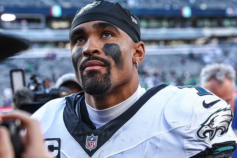 Oct 20, 2024; East Rutherford, New Jersey, USA; Philadelphia Eagles quarterback Jalen Hurts (1) looks up after the game against the New York Giants at MetLife Stadium. Mandatory Credit: Vincent Carchietta-Imagn Images