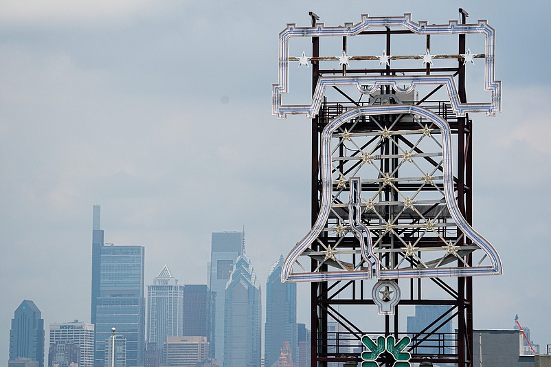 Jul 8, 2020; Philadelphia, Pennsylvania, United States; General view of the Philadelphia skyline behind the Liberty Bell sign at Citizens Bank Park. Mandatory Credit: Bill Streicher-USA TODAY Sports