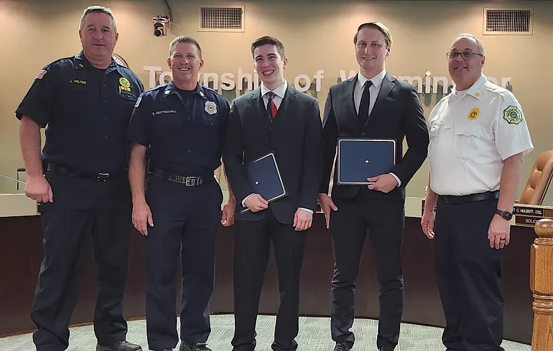 Eric Asta of Elkins Park and Brandon Go of Warminster Township were sworn in as Warminster firefighters on Oct. 10. (L to R): Joseph Velten, Director Emergency Management & Services, Warminster Township; Eric Gottschall, Deputy Chief, Hartsville Fire Company; Brandon Go; Eric Asta; and Mitch Shapiro, Chief, Warminster Fire Department. (Courtesy of Warminster Township)