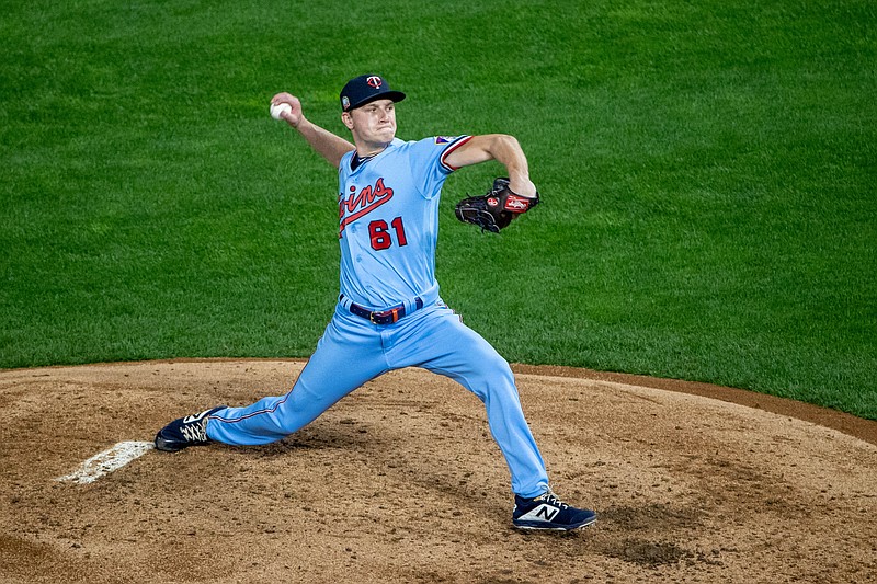 Sep 22, 2020; Minneapolis, Minnesota, USA; Minnesota Twins relief pitcher Cody Stashak (61) delivers a pitch in the fourth inning against the Detroit Tigers at Target Field. Mandatory Credit: Jesse Johnson-USA TODAY Sports