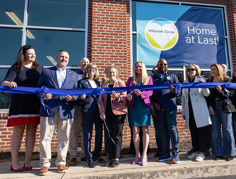 Local officials cut a ribbon to mark the opening of a new office for Mitzvah Circle on Wednesday, Oct. 30, 2024. (Credit: State Senator Maria Collett)