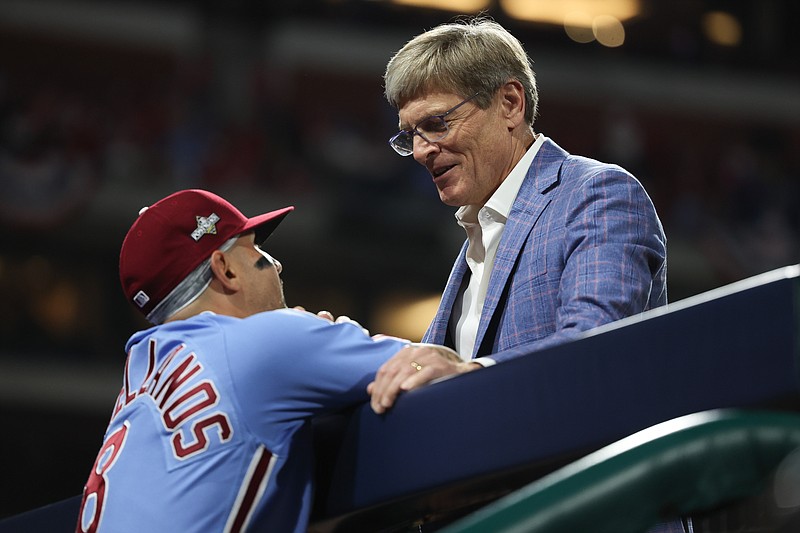 Oct 12, 2023; Philadelphia, Pennsylvania, USA; Philadelphia Phillies owner John Middleton meets with right fielder Nick Castellanos (8) before game four of the NLDS for the 2023 MLB playoffs at Citizens Bank Park. Mandatory Credit: Bill Streicher-USA TODAY Sports