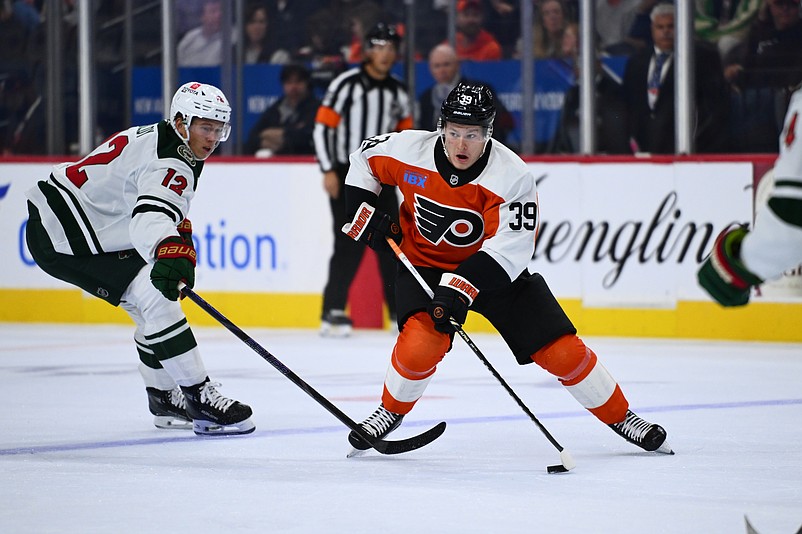 Oct 26, 2024; Philadelphia, Pennsylvania, USA; Philadelphia Flyers right wing Matvei Michkov (39) controls the puck against the Minnesota Wild in the first period at Wells Fargo Center. Mandatory Credit: Kyle Ross-Imagn Images