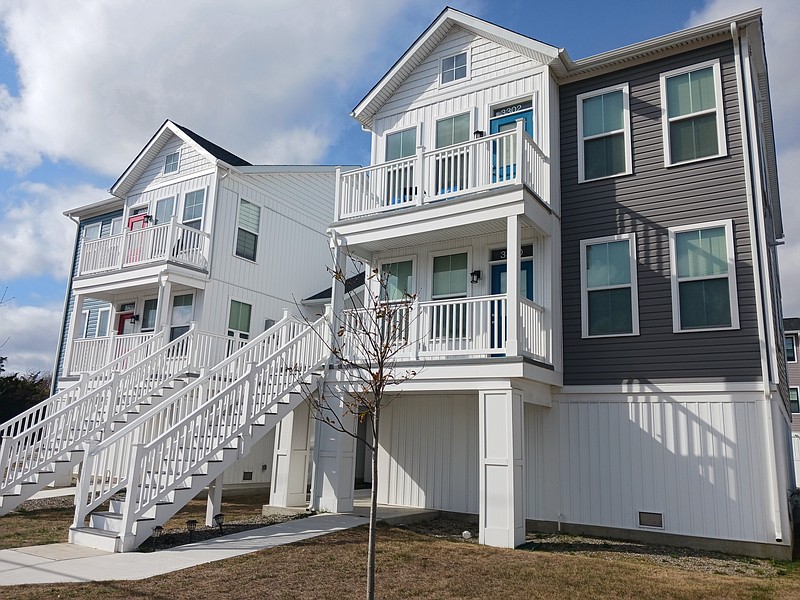 These two duplexes on Bay Avenue at 33rd Street are part of the affordable housing units built across town.