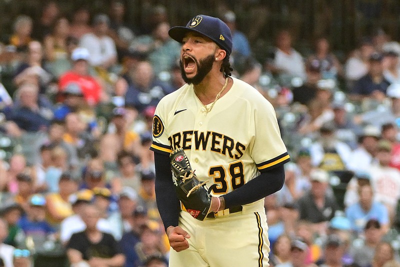 Aug 23, 2023; Milwaukee, Wisconsin, USA;  Milwaukee Brewers pitcher Devin Williams (38) reacts after getting out of a jam in the ninth inning against the Minnesota Twins at American Family Field. Mandatory Credit: Benny Sieu-USA TODAY Sports