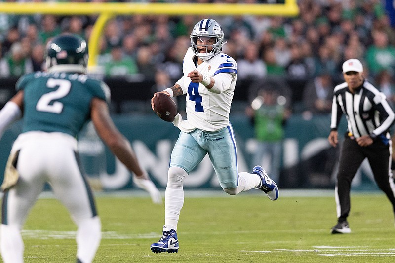 Nov 5, 2023; Philadelphia, Pennsylvania, USA; Dallas Cowboys quarterback Dak Prescott (4) runs with the ball against the Philadelphia Eagles during the first quarter at Lincoln Financial Field. Mandatory Credit: Bill Streicher-USA TODAY Sports