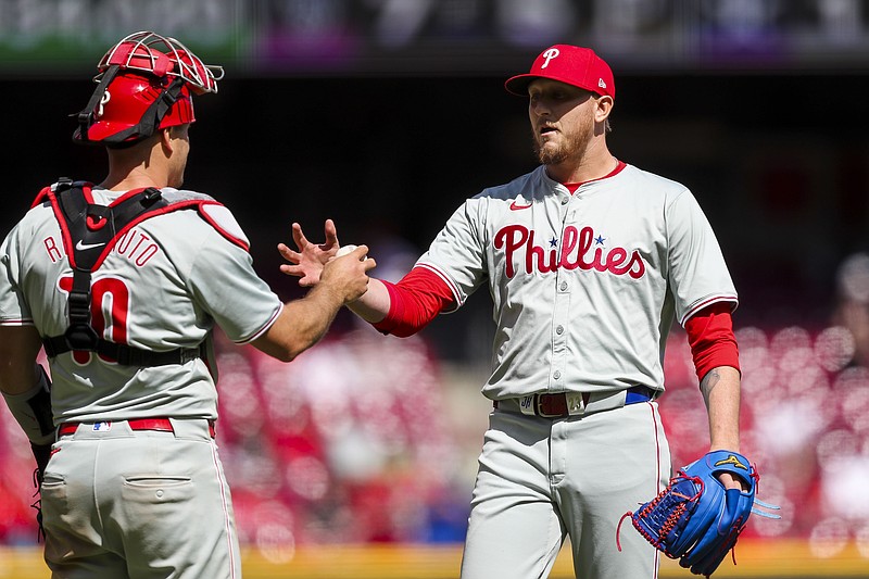 Apr 25, 2024; Cincinnati, Ohio, USA; Philadelphia Phillies pitcher Jeff Hoffman (23) shakes hands with catcher J.T. Realmuto (10) after the victory over the Cincinnati Reds at Great American Ball Park. Mandatory Credit: Katie Stratman-USA TODAY Sports