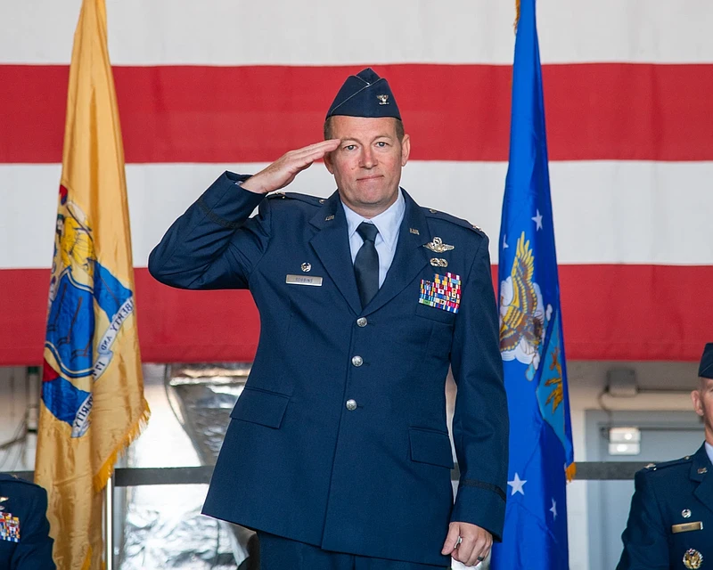 U.S. Air Force Col. Benjamin W. Robbins, 177th Fighter Wing commander, renders his first salute as 177th FW commander during a ceremony on Nov 3, 2024, at the 177th FW of the New Jersey Air National Guard, Egg Harbor Township, New Jersey. During the ceremony, Col. Derek B. Routt, Chief of Staff - Air for the New Jersey National Guard, relinquished command of the 177th FW to Robbins. (U.S Air Force photo by Senior Airman Darion Boyd)