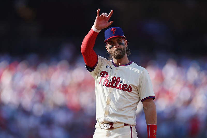 Oct 6, 2024; Philadelphia, Pennsylvania, USA; Philadelphia Phillies first base Bryce Harper (3) reacts in the first inning against the New York Mets during game two of the NLDS for the 2024 MLB Playoffs at Citizens Bank Park. Mandatory Credit: Bill Streicher-Imagn Images