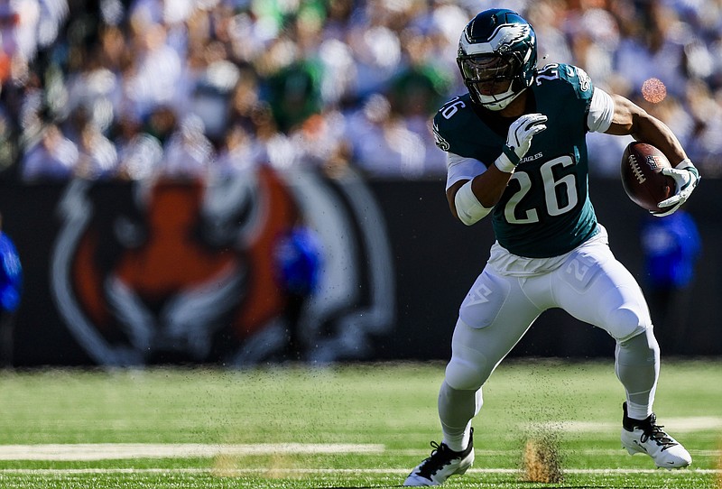 Oct 27, 2024; Cincinnati, Ohio, USA; Philadelphia Eagles running back Saquon Barkley (26) runs with the ball against the Cincinnati Bengals in the first half at Paycor Stadium. Mandatory Credit: Katie Stratman-Imagn Images