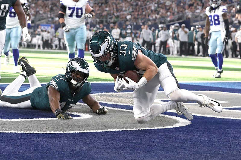 Nov 10, 2024; Arlington, Texas, USA; Philadelphia Eagles cornerback Cooper DeJean (33) recovers a fumble in the end zone in the second quarter against the Dallas Cowboys at AT&T Stadium. Mandatory Credit: Tim Heitman-Imagn Images