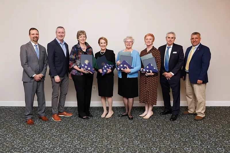 Award recipients receive proclamations from Congressman Brian Fitzpatrick and State Senator Frank Farry – pictured, from left, are Dave Herold, LVF CEO; Congressman Brian Fitzpatrick; Award Recipients Sharon Curran, Barbara Lyons, Kathleen Krick of the VIA and Diane Rosati of the Bucks County Drug & Alcohol Commission; Rob Hutchison, LVF Board President; State Senator Frank Farry. (Courtesy of Lenape Valley Foundation)