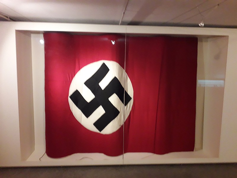 A nazi flag has been displayed in Whitpain Township, and the community's supervisors have spoken out against it. Pictured here, a Nazi socialist party flag taken down from the Korai 4 building which served as the Athens Kommandantur during the Axis occupation of Greece. [Memorial Site 1941-1944: Korai 4.] (Image courtesy of Creative Commons)