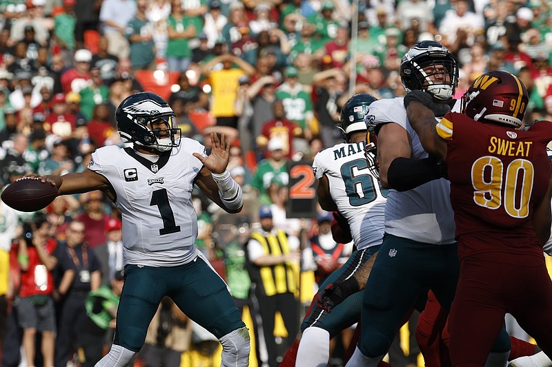 Oct 29, 2023; Landover, Maryland, USA; Philadelphia Eagles quarterback Jalen Hurts (1) passes the ball against the Washington Commanders during the fourth quarter at FedExField. Mandatory Credit: Geoff Burke-USA TODAY Sports