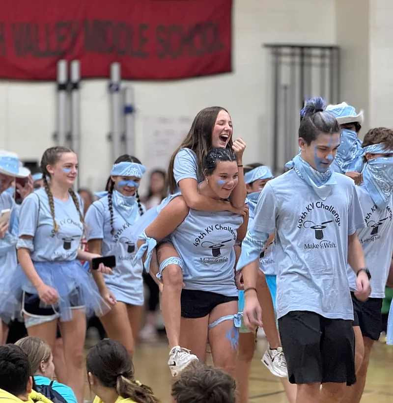 An eighth grade team enters the gym, ready to play hours of games for Make-A-Wish Foundation.(Photo by Hatboro-Horsham School District)