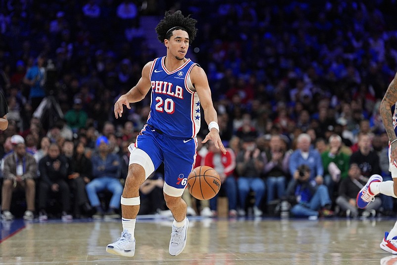 Nov 13, 2024; Philadelphia, Pennsylvania, USA; Philadelphia 76ers guard Jared McCain (20) controls the ball against the Cleveland Cavaliers in the second quarter at Wells Fargo Center. Mandatory Credit: Kyle Ross-Imagn Images