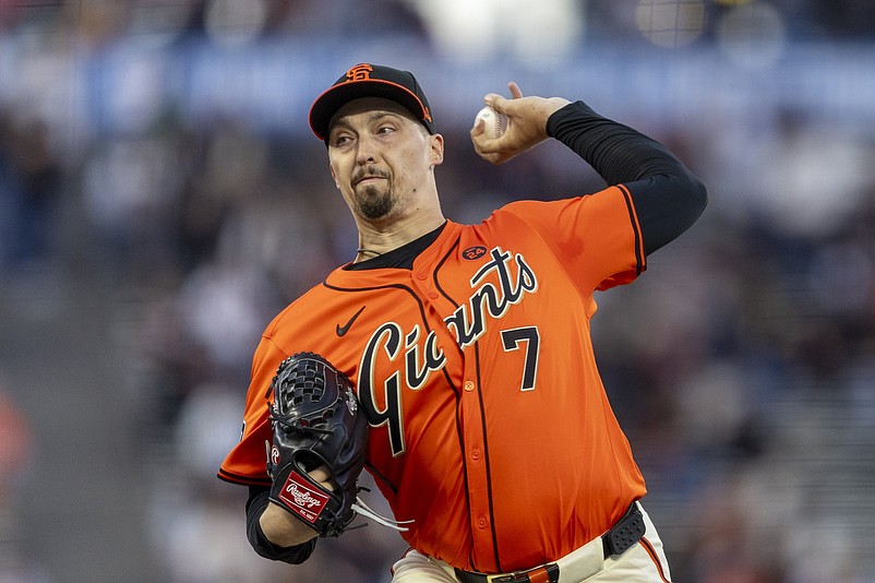 Aug 30, 2024; San Francisco, California, USA; San Francisco Giants starting pitcher Blake Snell (7) throws against the Miami Marlins during the first inning at Oracle Park. Mandatory Credit: John Hefti-USA TODAY Sports