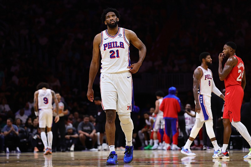 Nov 18, 2024; Miami, Florida, USA; Philadelphia 76ers center Joel Embiid (21) looks on against the Miami Heat during the third quarter at Kaseya Center. Mandatory Credit: Sam Navarro-Imagn Images