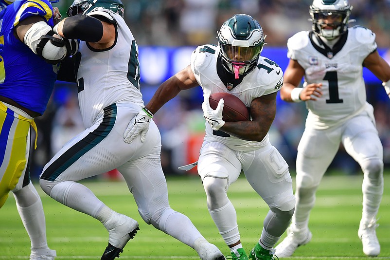 Oct 8, 2023; Inglewood, California, USA; Philadelphia Eagles running back Kenneth Gainwell (14) runs the ball against the Los Angeles Rams during the second half at SoFi Stadium. Mandatory Credit: Gary A. Vasquez-USA TODAY Sports