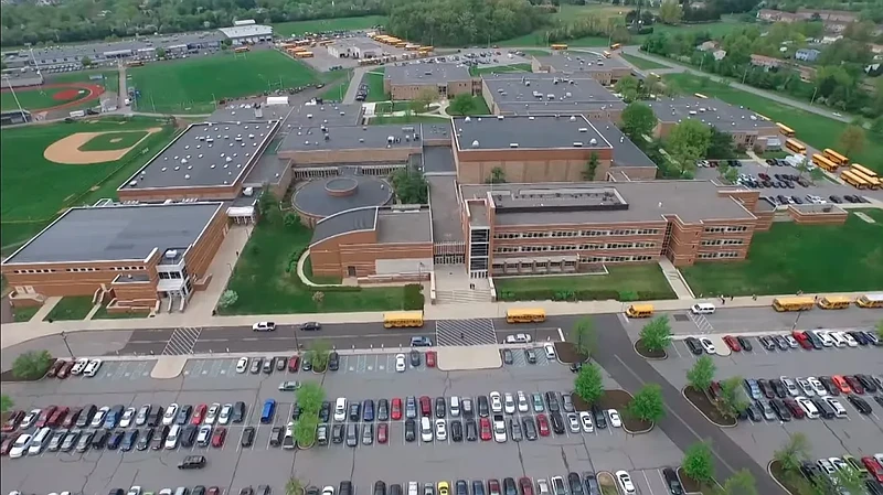 Aerial photo of North Penn High School, center, with district transportation garage at top center, North Montco Technical Career Center at top left, and former WNPV Radio site at top right, as seen in NPTV video “NPHS – A Building By Community.” (Screenshot of NPTV video)