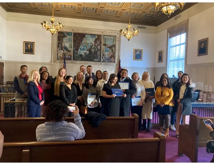 New citizens of the United States of America were greeted by members of Towamencin Chapter Daughters of the American Revolution (DAR) on Thursday, Nov. 14, at the Naturalization to the United States of America ceremony held at Montgomery County Court House in Norristown. (Photo courtesy of Towamencin DAR)