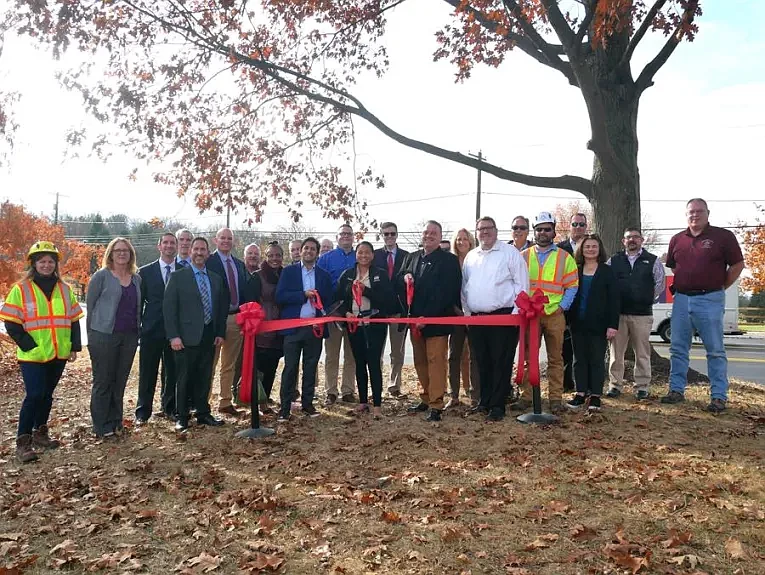 Montgomery County Commissioners Neil Makhija, Jamila Winder and Tom DiBello were accompanied by members of the Planning Commission, Transportation Authority, and local Townships to celebrate the completion of the first section of the Ridge Pike Improvement Project. (Photo courtesy Montgomery County PA)