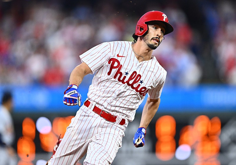 Aug 25, 2023; Philadelphia, Pennsylvania, USA; Philadelphia Phillies catcher Garrett Stubbs (21) advances toward third on his way to scoring against the St. Louis Cardinals in the second inning at Citizens Bank Park. Mandatory Credit: Kyle Ross-USA TODAY Sports