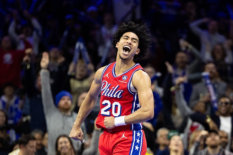 Nov 22, 2024; Philadelphia, Pennsylvania, USA; Philadelphia 76ers guard Jared McCain (20) reacts to his three pointer against the Brooklyn Nets during the fourth quarter at Wells Fargo Center. Mandatory Credit: Bill Streicher-Imagn Images