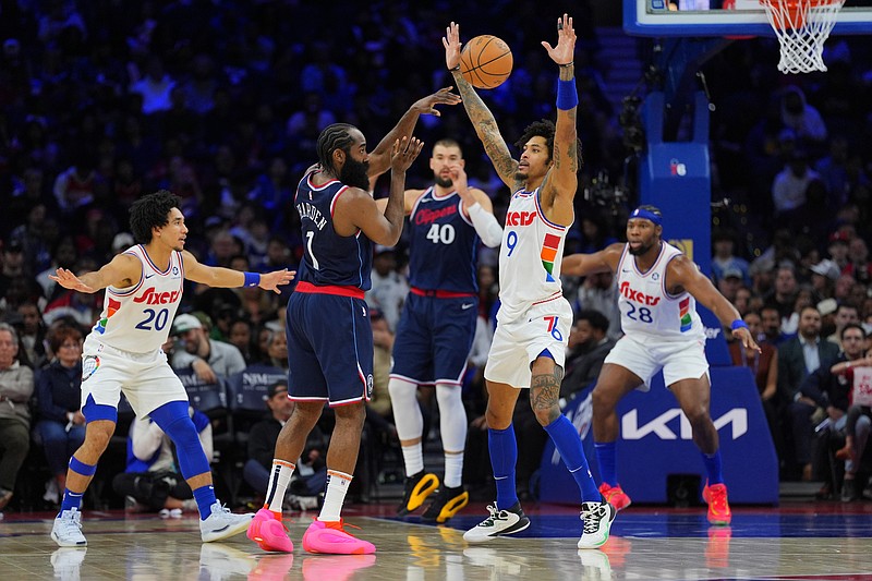 Nov 24, 2024; Philadelphia, Pennsylvania, USA; Los Angeles Clippers guard James Harden (1) passes the ball against Philadelphia 76ers guard Kelly Oubre Jr (9) in the second quarter at Wells Fargo Center. Mandatory Credit: Kyle Ross-Imagn Images