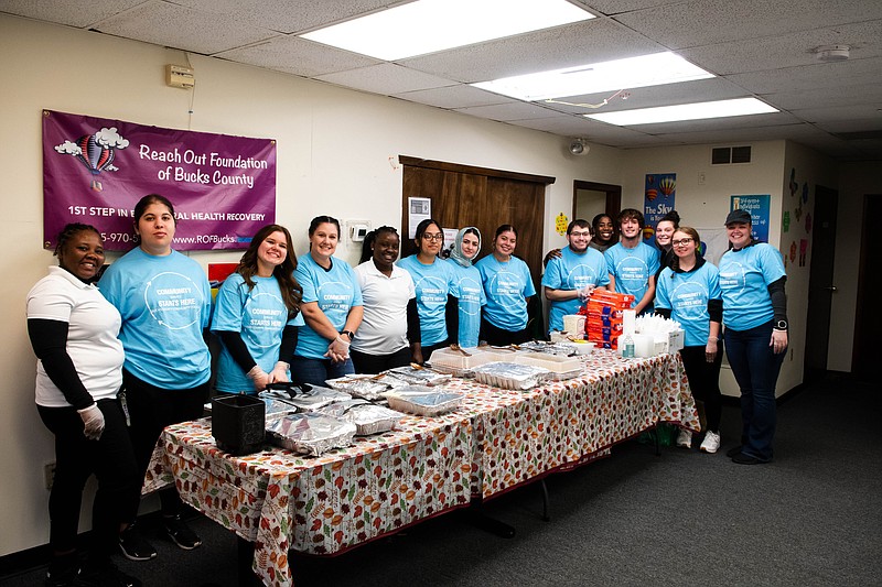 (L to R:) During the Inaugural Bucks Student Day of Service on Friday, November 22, BCCC students Deanna Vohl, Morgan Hangey, Christina Hackney, Katherine Aguilar, Shabana Abedy, Maria Escobar, Johnny Tate, Timothy Loteckie, Stephanie Hangey, and Alexis Crohe joined staff members at Reach Out Foundation of Bucks County in Penndel, Pa. to serve a Thanksgiving meal to members of the community. (Credit: BCCC)