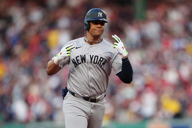 Jul 27, 2024; Boston, Massachusetts, USA; New York Yankees left fielder Juan Soto (22) reacts to hitting a two-run home run against the Boston Red Sox during the first inning at Fenway Park. Mandatory Credit: Gregory Fisher-USA TODAY Sports