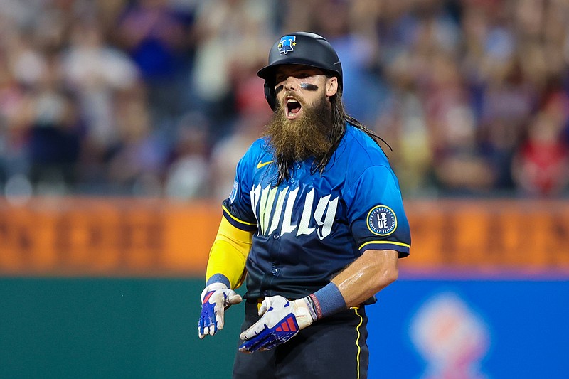 Aug 16, 2024; Philadelphia, Pennsylvania, USA; Philadelphia Phillies outfielder Brandon Marsh (16) reacts after reaching second base on a Washington Nationals error during the ninth inning at Citizens Bank Park. Mandatory Credit: Bill Streicher-USA TODAY Sports