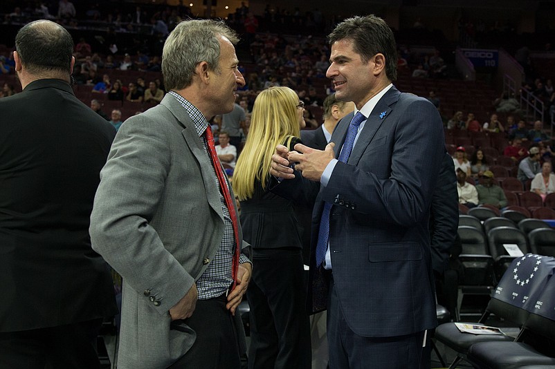 Apr 4, 2017; Philadelphia, PA, USA; Philadelphia 76ers owner Joshua Harris (L) and chief executive officer Scott O'Neil (R) talk during a game against the Brooklyn Nets at Wells Fargo Center. The Brooklyn Nets won 141-118. Mandatory Credit: Bill Streicher-USA TODAY Sports