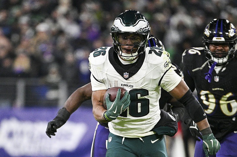 Dec 1, 2024; Baltimore, Maryland, USA; Philadelphia Eagles running back Saquon Barkley (26) rushes for a touchdown during the second  half  against the Baltimore Ravens at M&T Bank Stadium. Mandatory Credit: Tommy Gilligan-Imagn Images