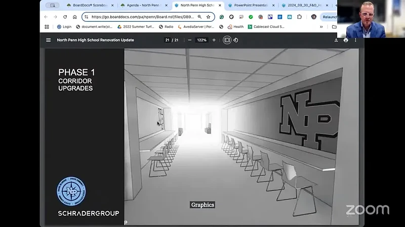 Architect David Schrader shows a rendering of hallways inside North Penn High School, with lockers removed to add seating for students, during the school board facilities and operations committee meeting on Monday, Nov. 25, 2024. (Screenshot of NPTV video)