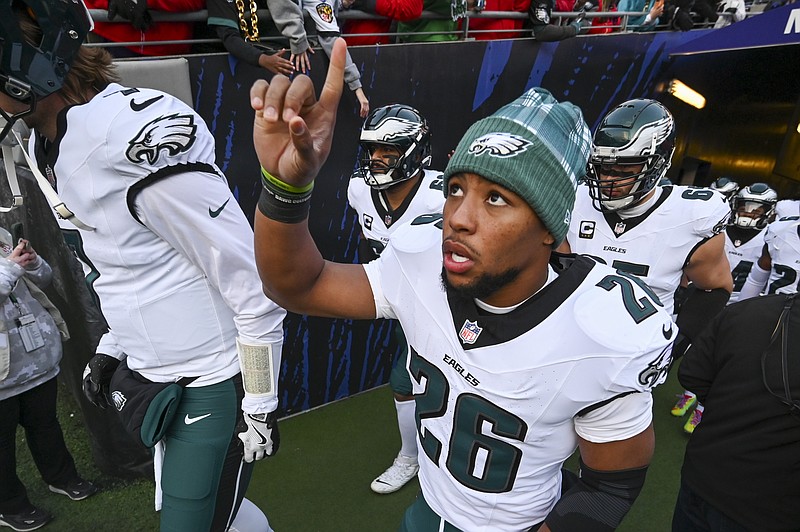 Dec 1, 2024; Baltimore, Maryland, USA; Philadelphia Eagles running back Saquon Barkley (26) takes the field with teammates before the game against the Baltimore Ravens  at M&T Bank Stadium. Mandatory Credit: Tommy Gilligan-Imagn Images