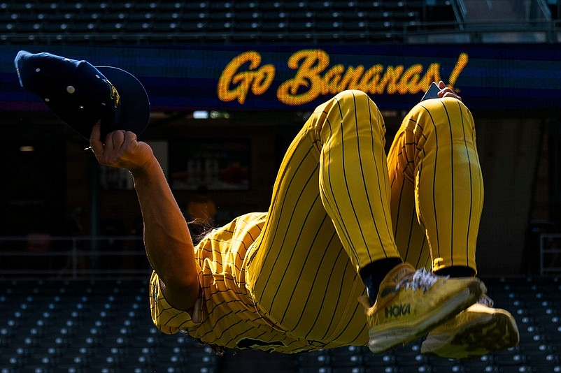 Savannah Bananas infielder Robert Anthony Cruz (15) does a backflip Thursday, June 27, 2024, during a Savannah Bananas World Tour show at Victory Field in Indianapolis.