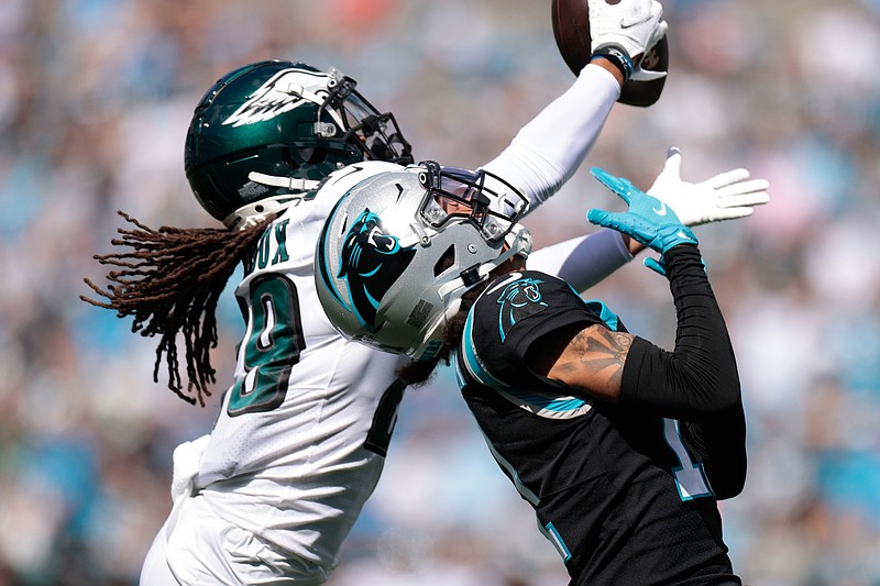 Oct 10, 2021; Charlotte, North Carolina, USA; Philadelphia Eagles free safety Avonte Maddox (29) breaks up a pass intended for Carolina Panthers wide receiver Robby Anderson (11) during the first half at Bank of America Stadium. Mandatory Credit: Douglas DeFelice-USA TODAY Sports