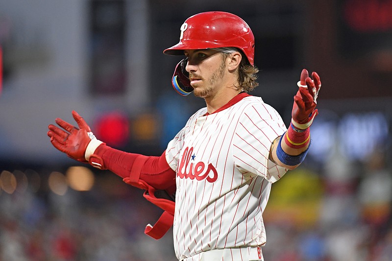 Jul 10, 2024; Philadelphia, Pennsylvania, USA;  Philadelphia Phillies second base Bryson Stott (5) reacts after hitting an RBI single during the fifth inning against the Los Angeles Dodgers at Citizens Bank Park. Mandatory Credit: Eric Hartline-USA TODAY Sports